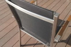 OUTFLEXX Stapelsessel, Schwarz, FSC-Teak / Edelstahl / Textilene, 63x57x93 Cm -Warmer Garten 21670 6.JPG