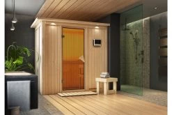 KARIBU Variado Sauna, Naturbelassen, Fichte, 210 X 132 X 202 Cm, Fronteinstieg,mit Bronzierter Tür Und Kranz, SET Mit Ofen 4,5 KW Ext. Strg. Easy